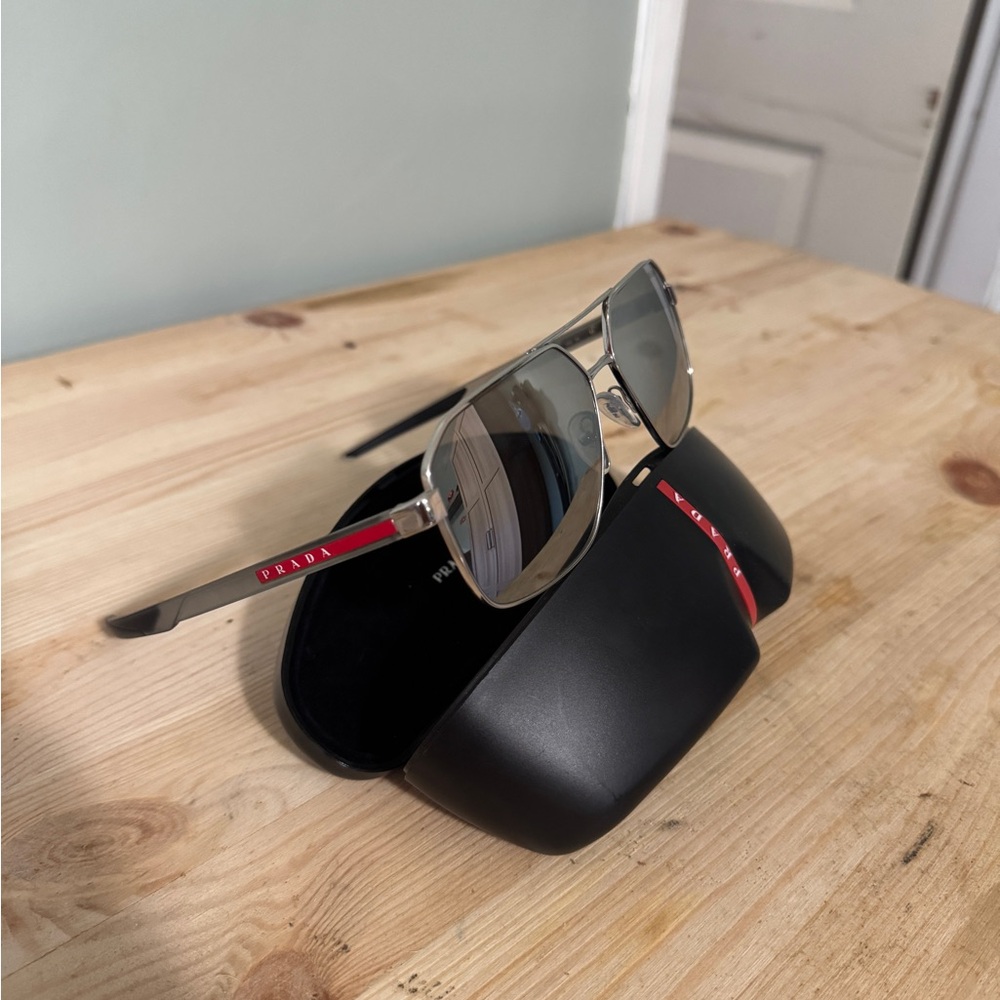 Prada Metallic Silver Sunglasses with Red Detail